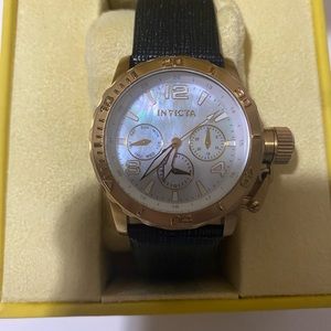 Black leather ladies Invicta with mother of pearl face